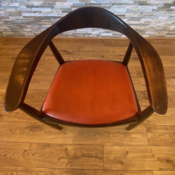 Curved Vintage Real Orange Leather Chair seated on a Dark Oak Frame