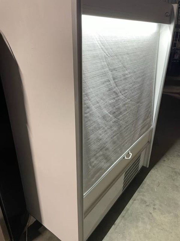 Grab and go fridge with night blind