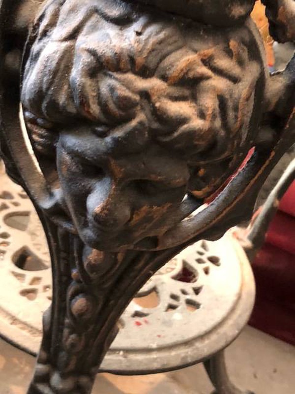 Cast iron table with girls head