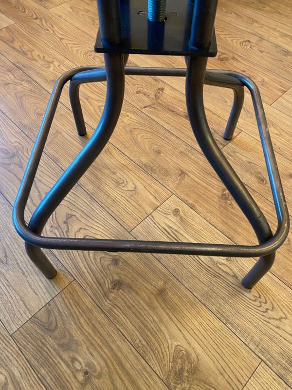 Secondhand Used Black Leather Seated Industrial Kitchen Bar Stool Style Stool with a Steel Frame For Sale