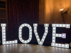 Secondhand 5ft LED LOVE Sign by Portable Floor Maker For Sale