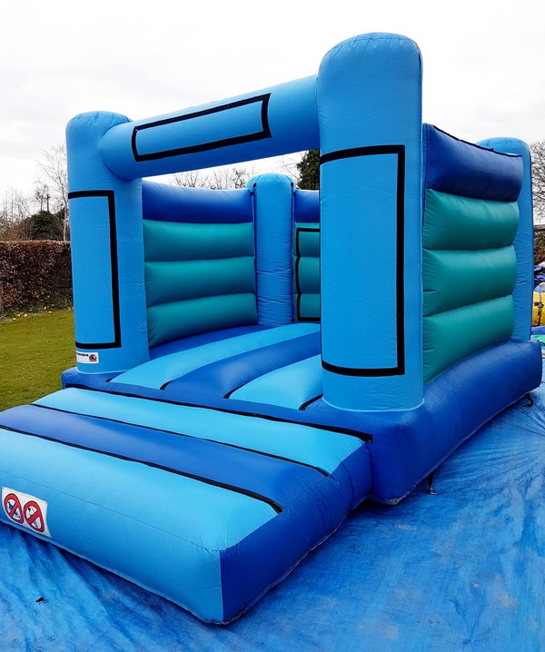 Bouncy castle with detachable Velcro panels