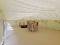 Framed marquee with ivory pleated lining