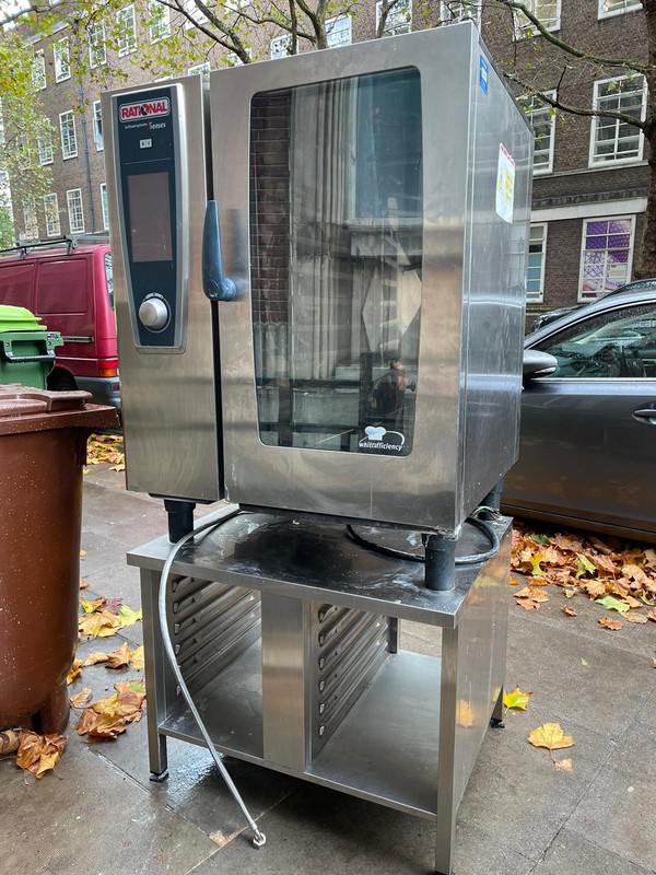 Secondhand Rational White Efficiency 5 Senses 10 Grid Combi Oven and Stand For Sale