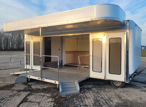 Exhibition trailer with wings folded