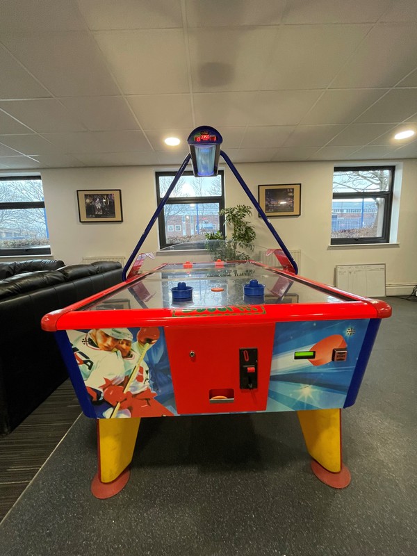 Air hockey table coin operated
