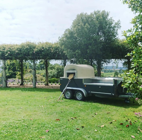 wood fired pizza oven on a trailer for weddings