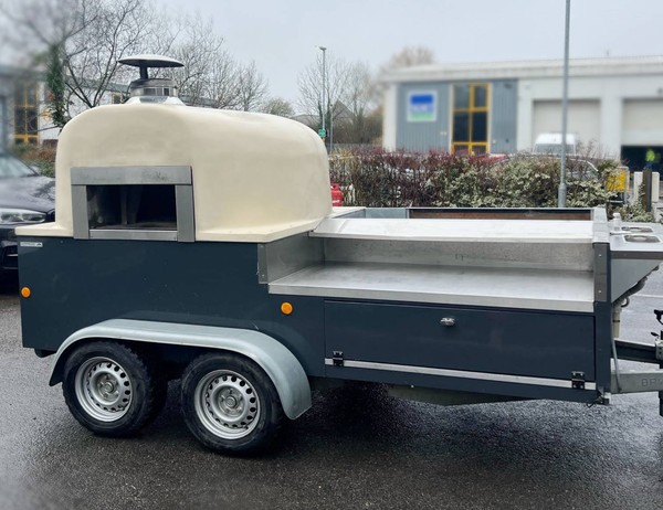 Pizza trailer with stainless steel prep area
