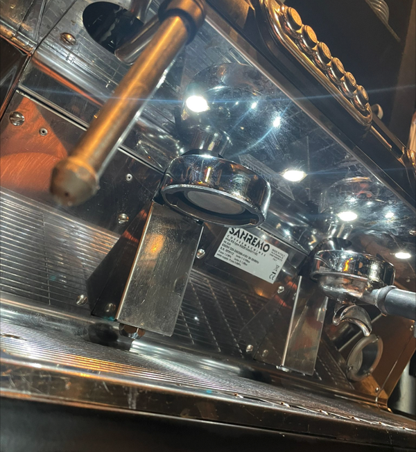 Espresso maker and grinder