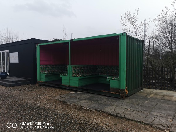 Converted shipping container