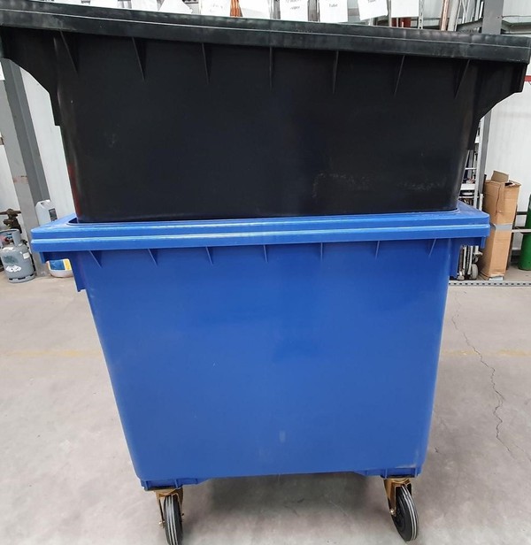 Blue and black large wheeled bins