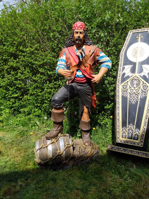 Pirate and Barrel Statues Pirate and Barrel Statues
