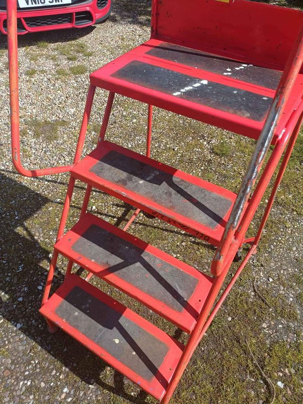 Portable steps to access racking
