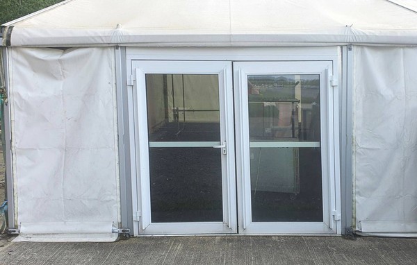 Marquee doors with panic bar