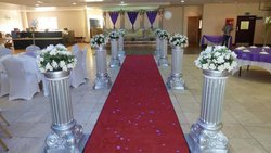 Secondhand 8pc Silver Fibre Walkway Pillars with Red Carpet For Sale