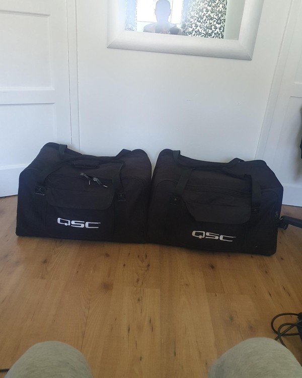 Secondhand Used Pair of QSC K12 Loud Speakers with Bags For Sale