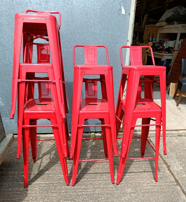Red metal Tolix style high bar stools