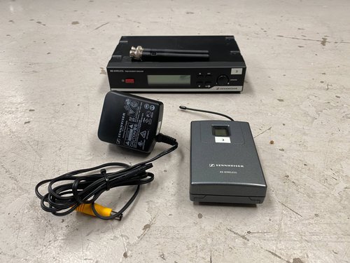 XS Wireless microphone transmitter and receiver. XS Wireless microphone transmitter and receiver.