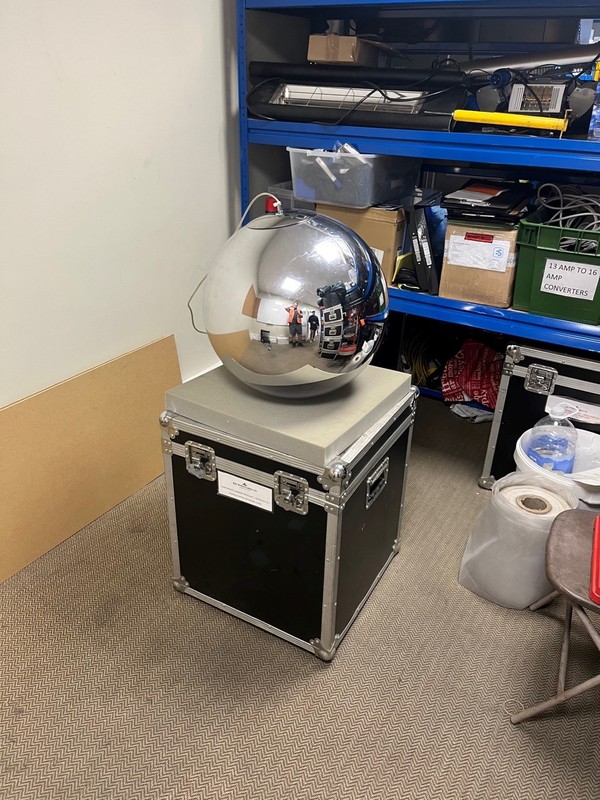 Silver Sphere Lights on top of a flight case