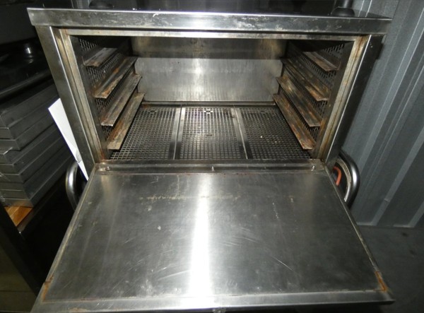 Four shelf  oven for sale