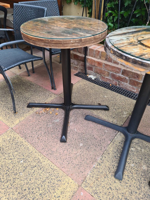 Glass toped reclaimed tables