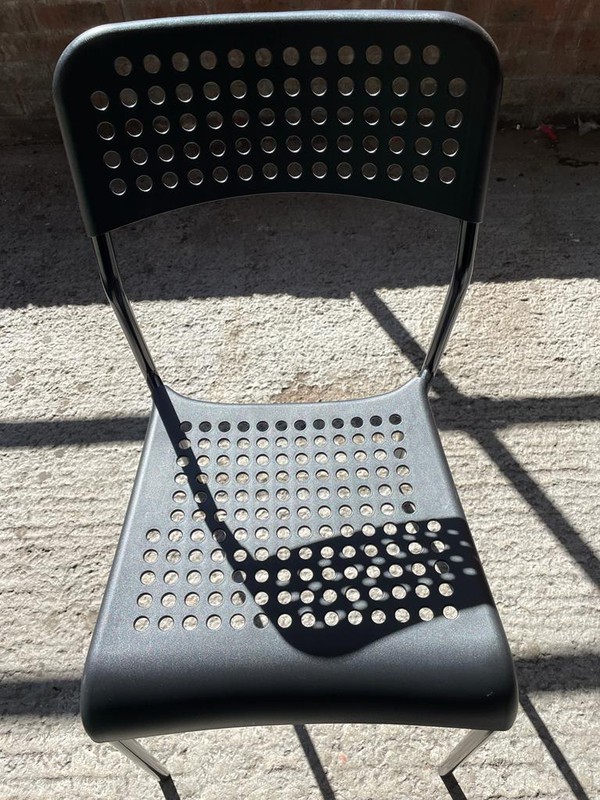 Plastic / metal framed stacking chairs