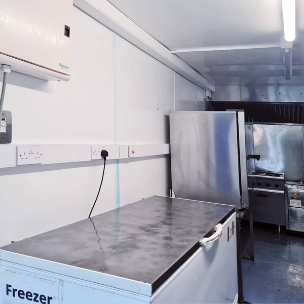 Mobile kitchen with frozen food storage