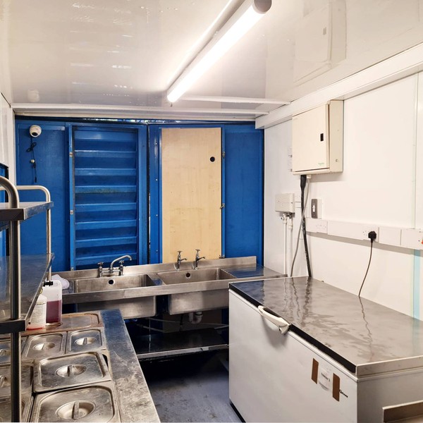 Portable kitchen in a container