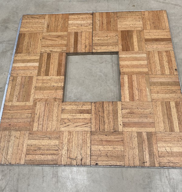 Parquet dance floor with cut out for main pole