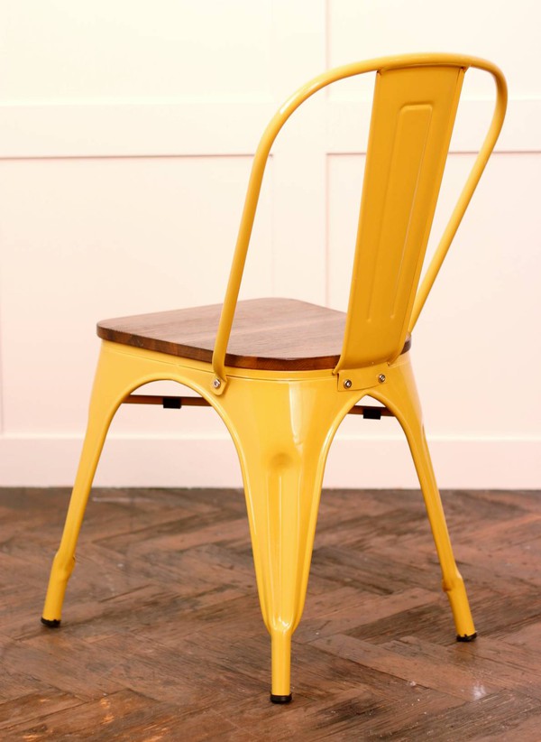 Yellow Tolix chairs for sale with wooden seats
