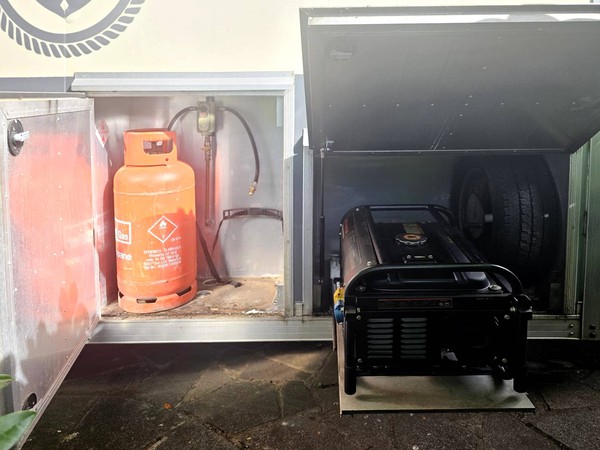 Gas bottle locker and generator