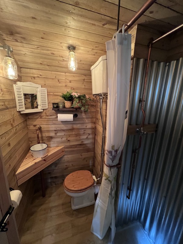 Rustic little house style toilet trailer