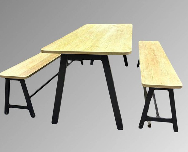 Wooden dining table with benches