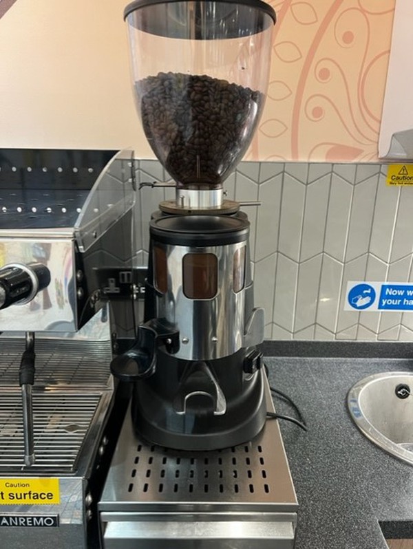 Coffee grinder for coffee machine