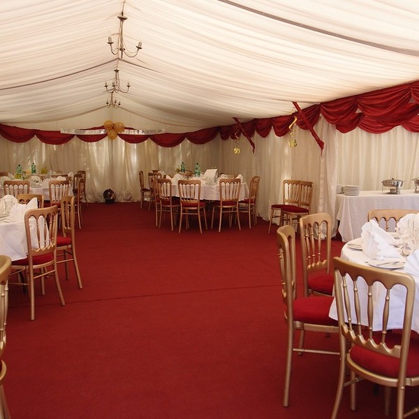 Secondhand Used Gold Cheltenham Banquet Chairs With Red Pads For Sale
