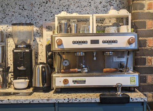 Premium Photo  Home coffee station coffee bar kitchen coffee corner with  coffee machine coffee beans tea sweets and toppings for drinks