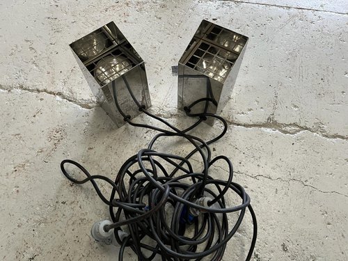 2 x Uplighters in stainless steel casing 2 x Uplighters in stainless steel casing
