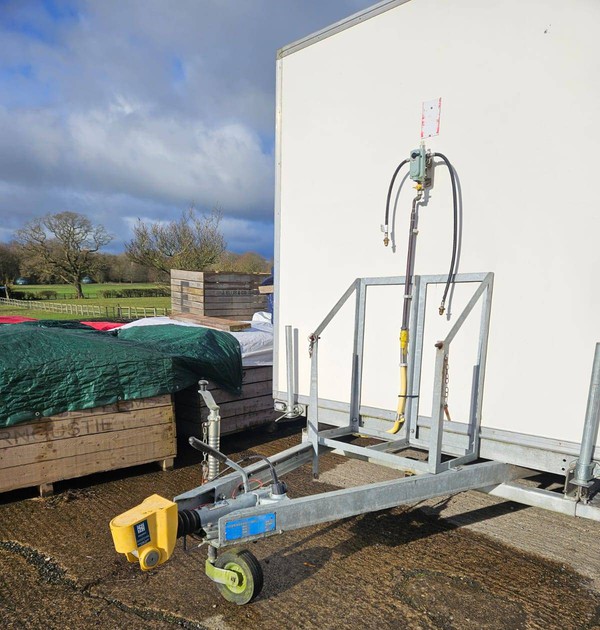 Shower trailer tow hitch