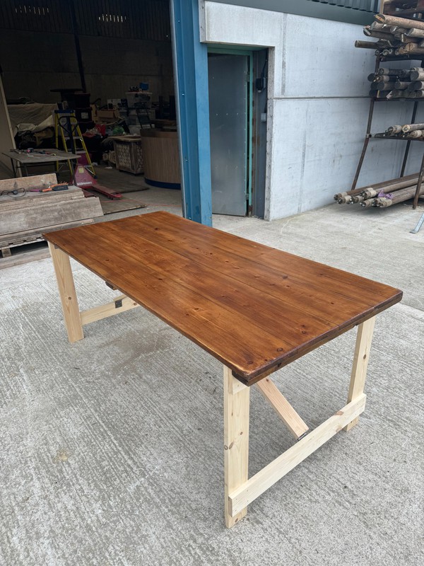 Plank top trestle table