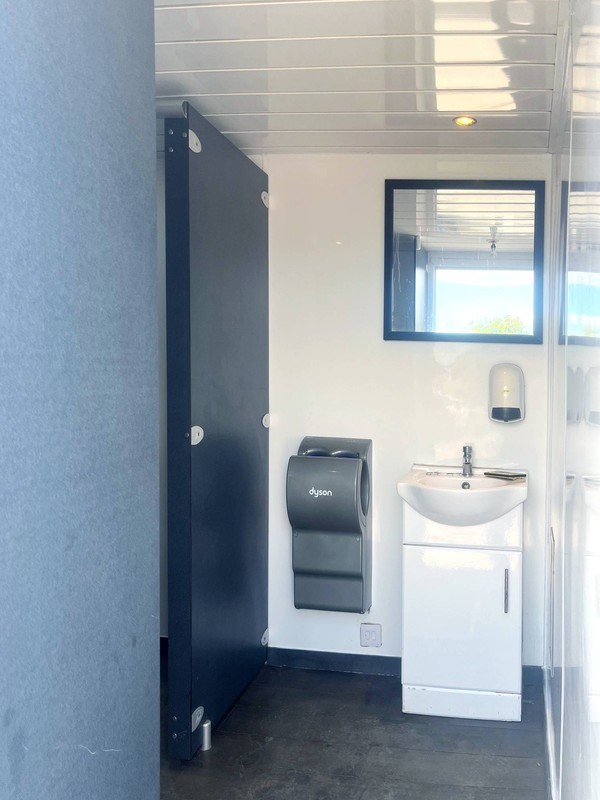 Toilet trailer with clean white interior
