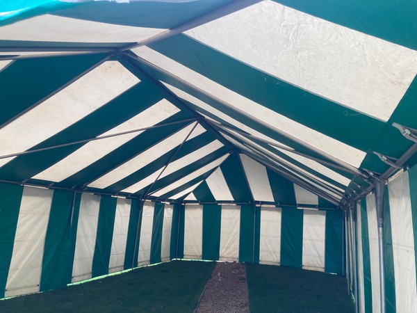 Green and white Armbruster marquee 6m by 12m (20’ by 40’)