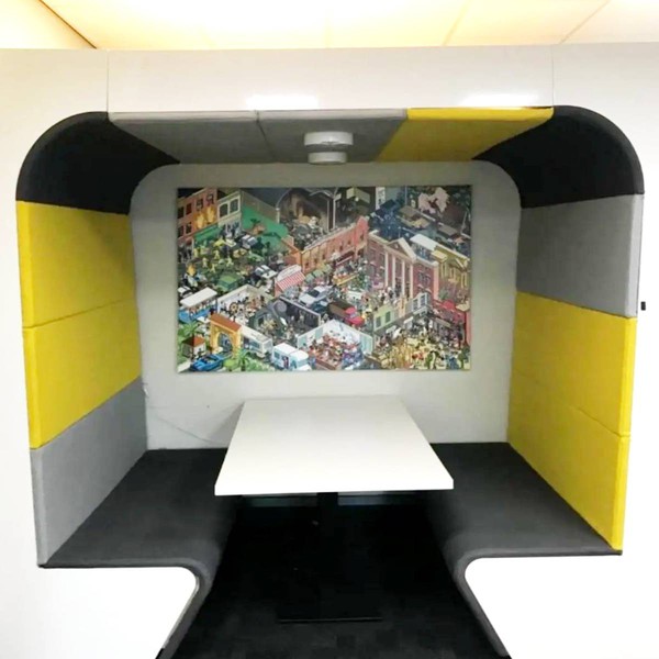 meeting pod with benches and tables