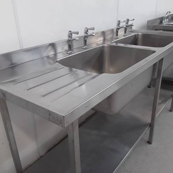 Kitchen sink with taps