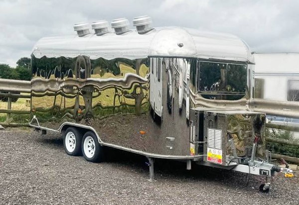 Polished aluminium catering trailer