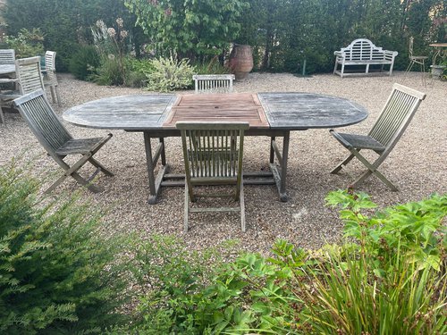 Oval teak dining table and chairs Oval teak dining table and chairs