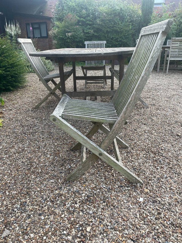 Used teak outdoor table with patina