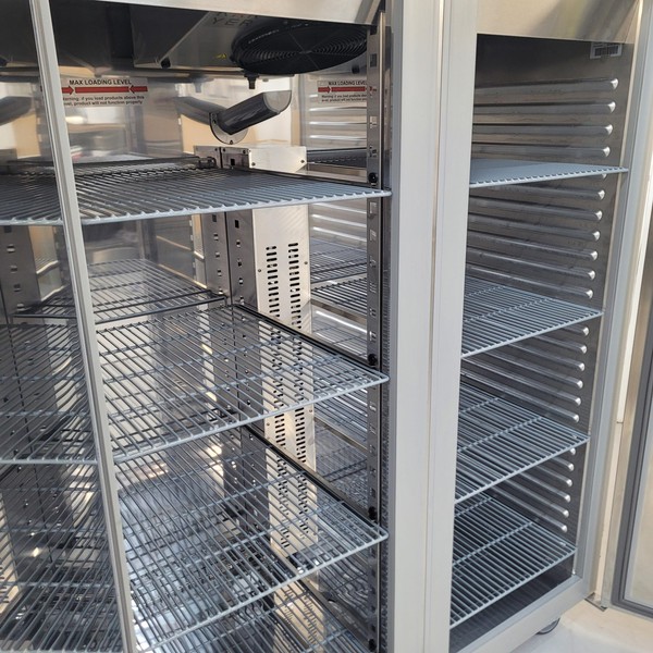 Double fridge with wire shelves