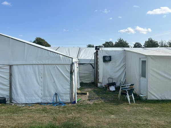 Bar marquee and storage container