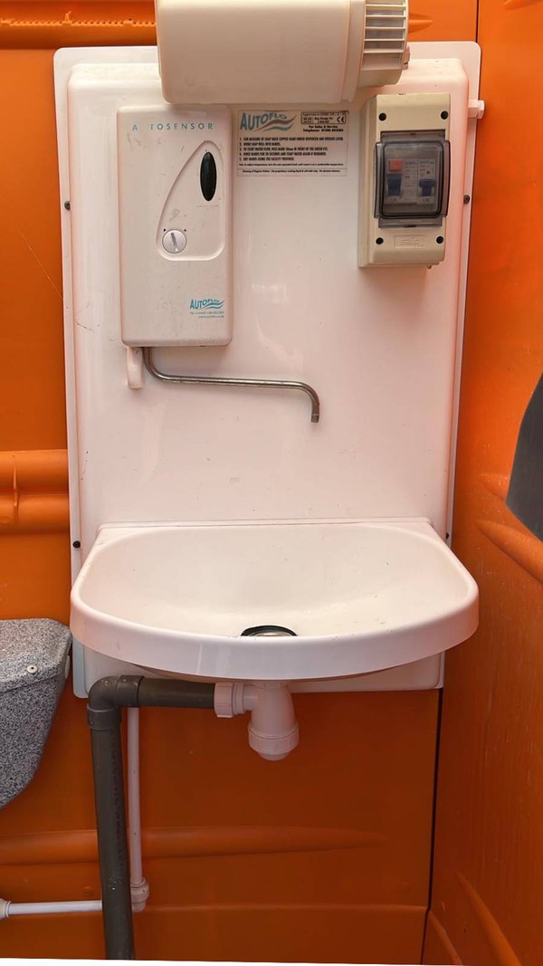 Toilet with hot water