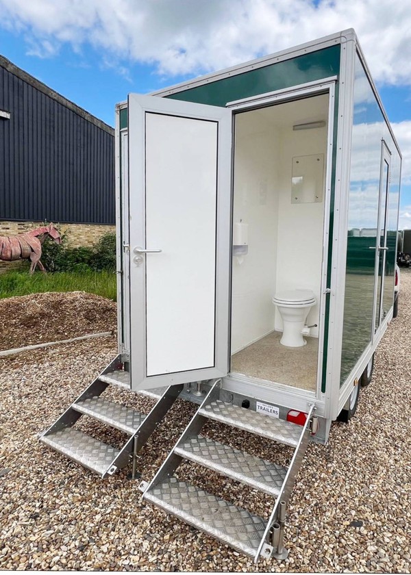 Two rear facing toilet cubicle + one side